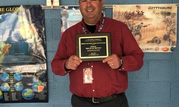 Mr. Finney Presented With Plaque for Teacher of the Year Award